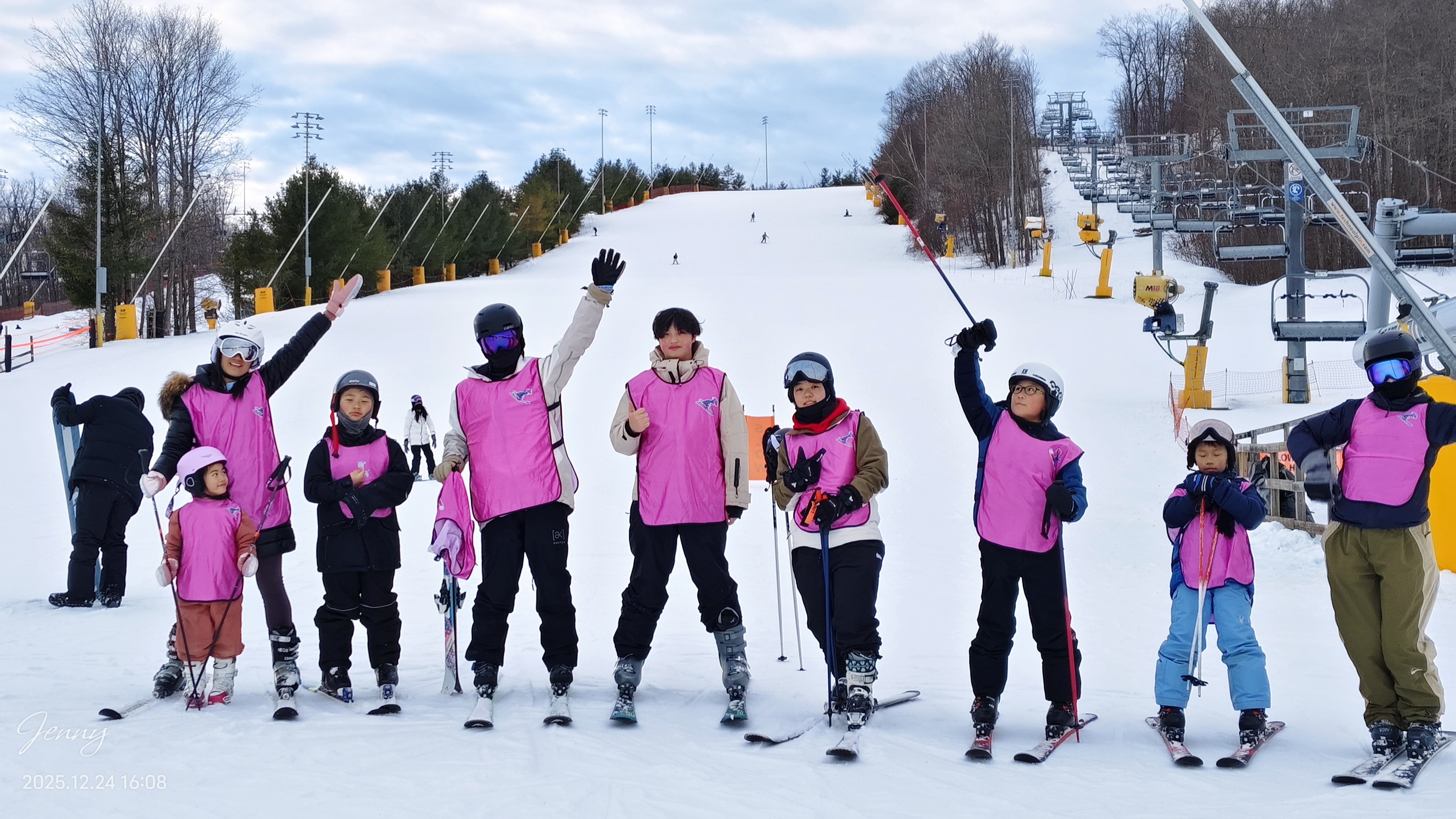 Group of children and instructors on a ski slope